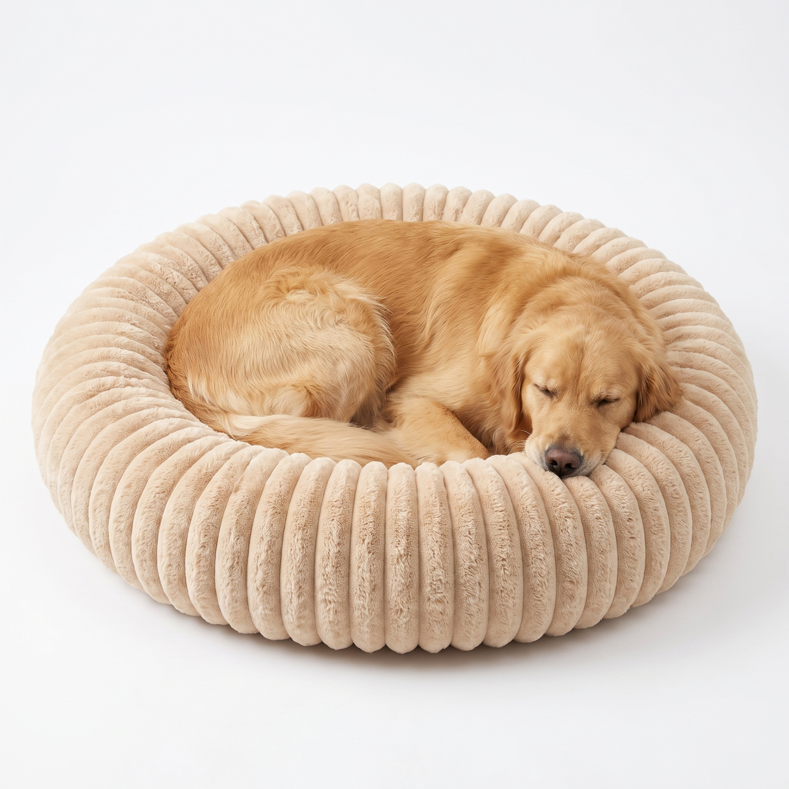 A dog settled in the grey STILL bed